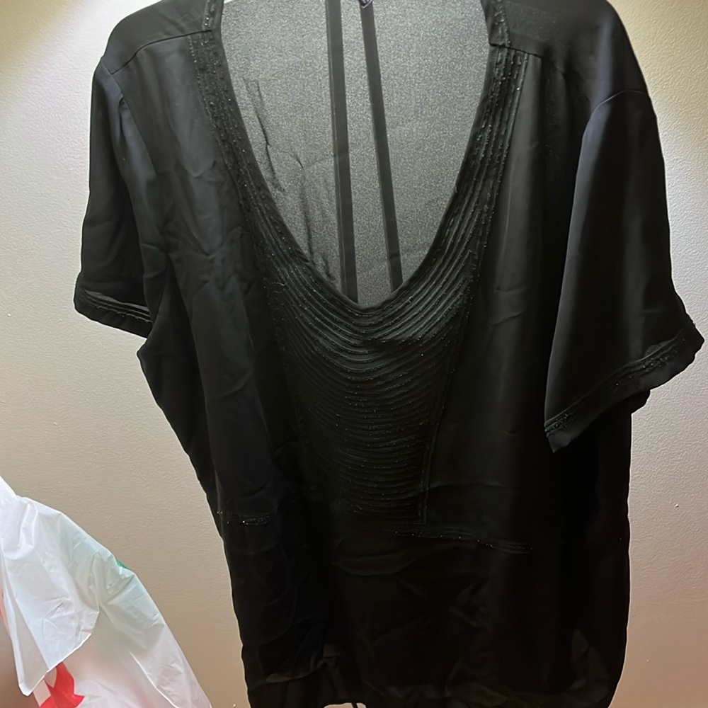 Black blouse with beautiful ribbon trim around neck and sleeves